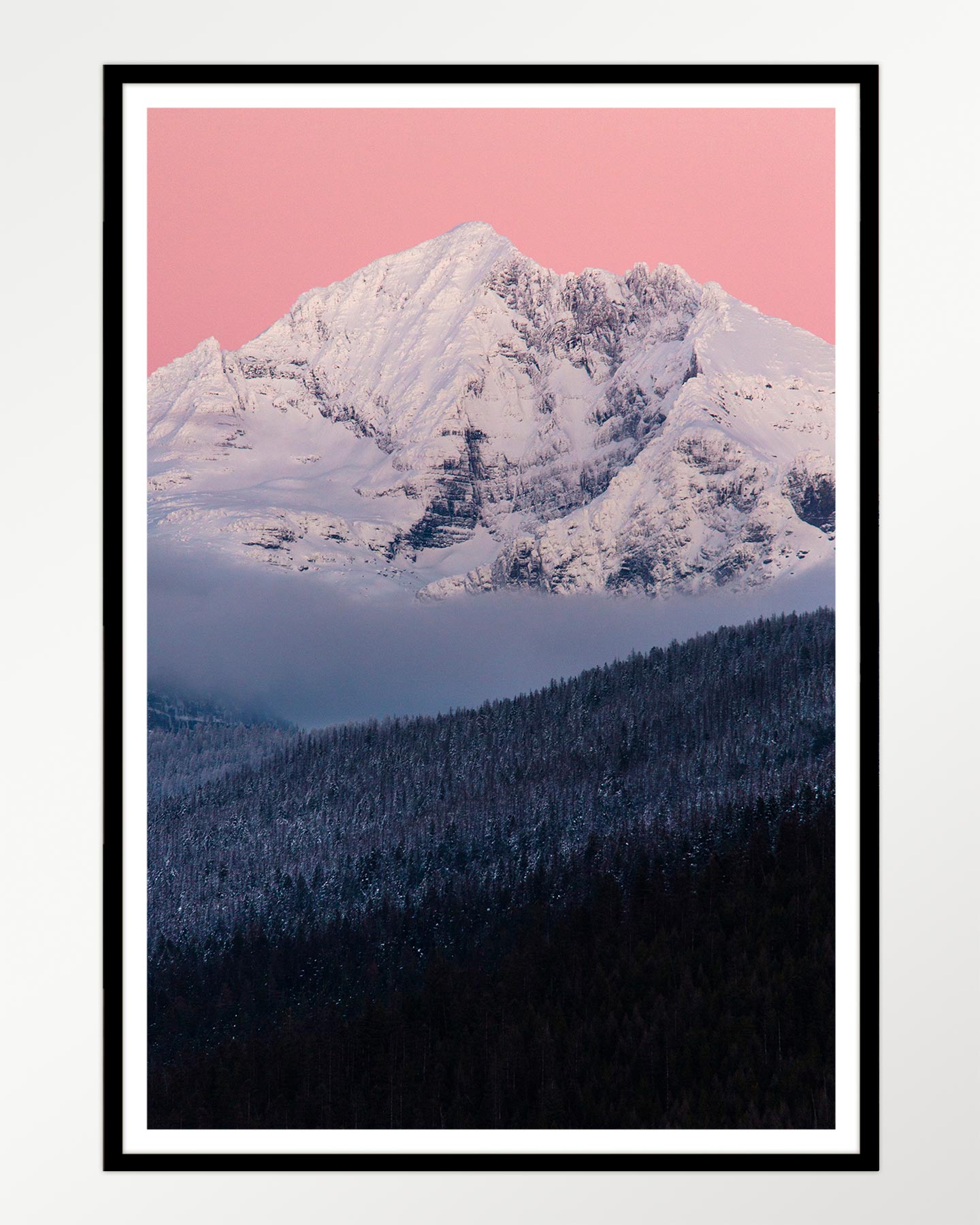 Pink dawn over frosted peaks