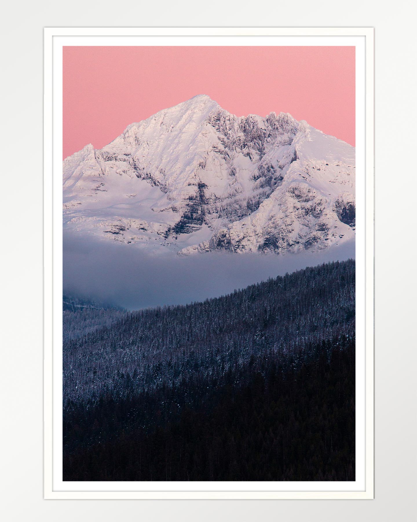 Pink dawn over frosted peaks