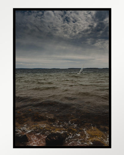 Sailing under brooding skies