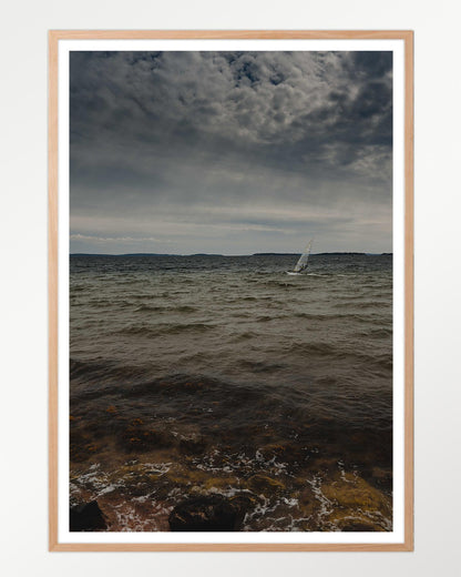 Sailing under brooding skies